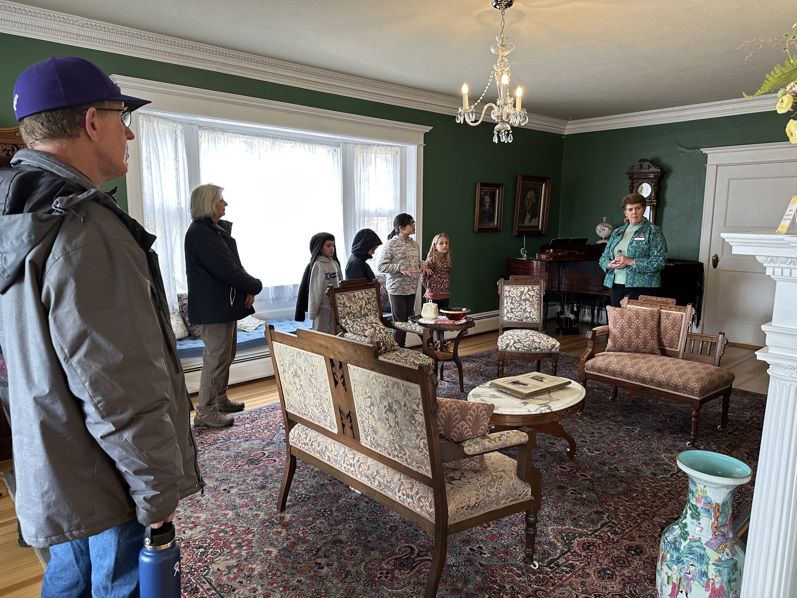 docent giving a guided tour at the stanley home museum